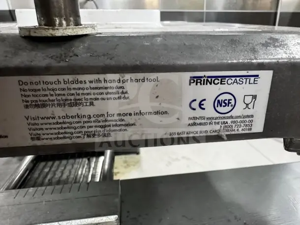 Prince Castle 980-000-00 Saber King food slicer, NSF certified, metal body, warning labels, fully tested for commercial use.