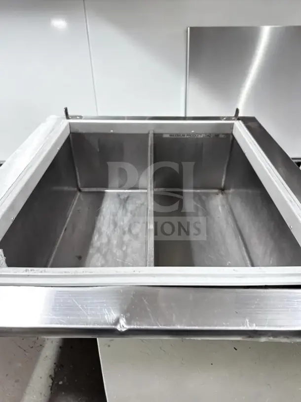 Silver King SKFDI23-ELUS1, 22.5" drop-in ice cream dipping freezer, 2-section, stainless steel, excellent condition, ETL listed.