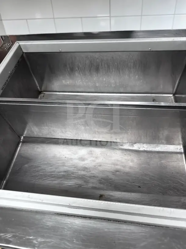 Silver King SKFDI23-ELUS1 ice cream dipping freezer, 22.5" drop-in, two sections, stainless steel, excellent condition, ETL listed.