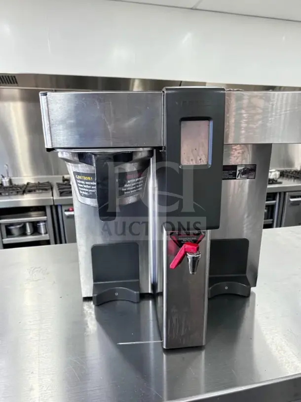 FETCO CBS-2132XTS stainless steel double automatic coffee brewer in optimal condition, fully tested, 240V, model E213251.
