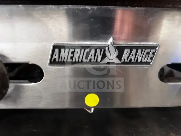 American Range logo on ARSMG-24 countertop gas griddle, stainless steel finish, natural gas, excellent condition, ETL listed.