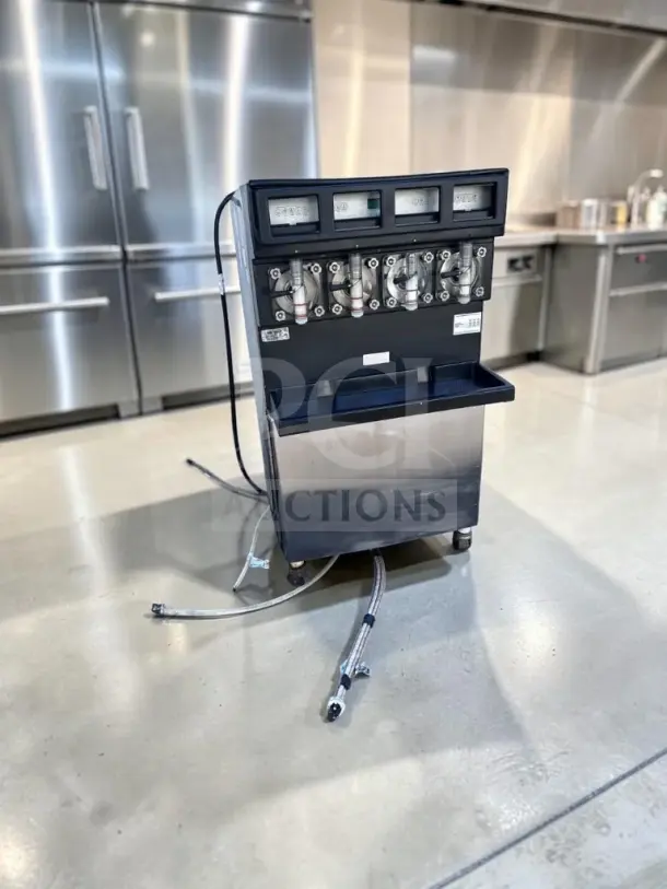 Taylor 349-33 four-flavor slush machine in exceptional condition, tested and operational. UL/NSF listed, 208–230V, 3-phase.