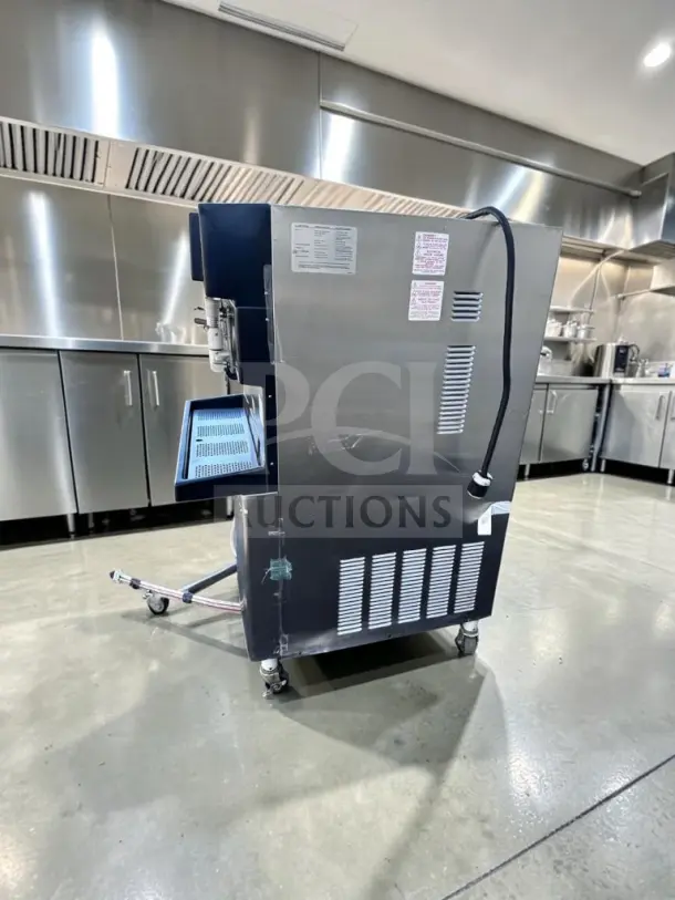 Taylor 349-33, 4-flavor frozen beverage machine, exceptional condition, 208-230V, 3-phase, UL/NSF listed, side view.
