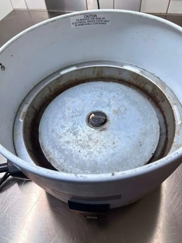 Thunder Group SEJ-50000 rice cooker, large capacity, in outstanding condition. NSF & UL listed. Interior view shows caution label.