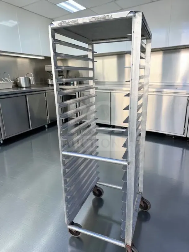 Commercial-grade aluminum sheet pan rack, holds 20 pans, heavy-duty with casters, premium condition, model ALU-M-RCK-0575.