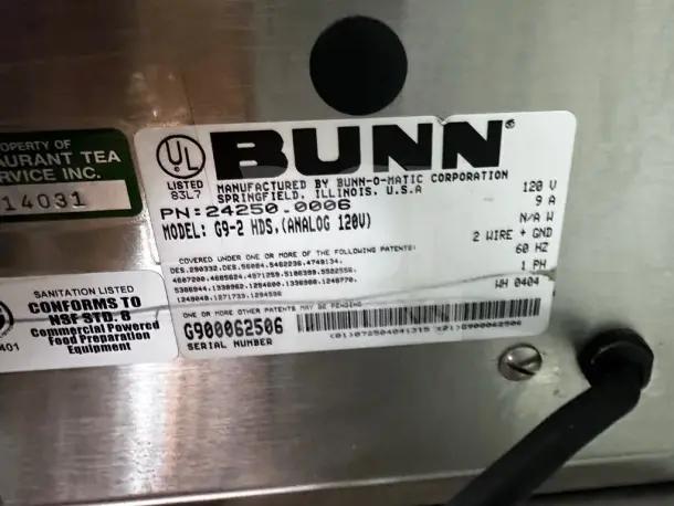 Bunn-O-Matic G9-2T DBC Tall Coffee Grinder label showing model, serial number, 120V, UL listed, NSF conformance.