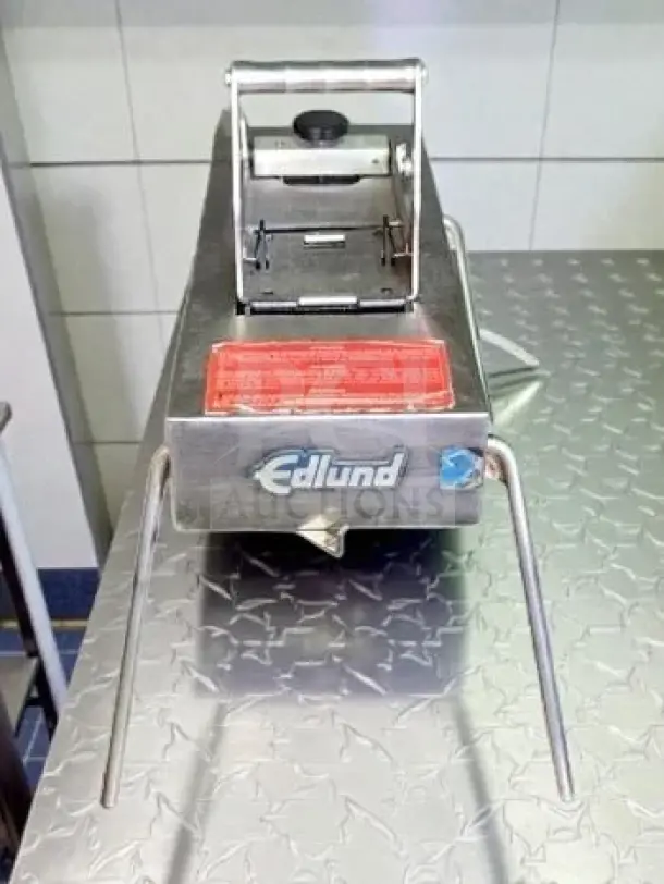 Edlund Series 350 commercial electric slicer, stainless steel and aluminum, NSF listed, 115V, fully operational, tested.