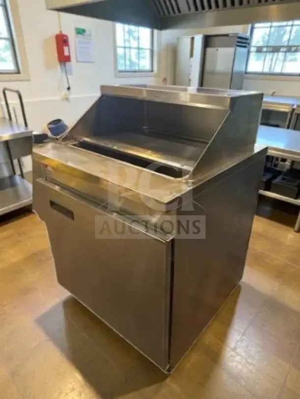 Stainless steel Randell 9412-2-7 refrigerated sandwich prep table, pristine condition, 8.62 cu. ft., 115V, NSF/UL listed.