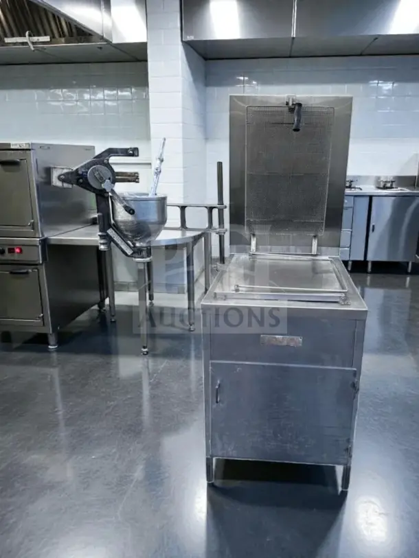 Lucks G1826 commercial donut fryer, stainless steel, 60,000 BTU, with donut screen and manual depositor in excellent condition.