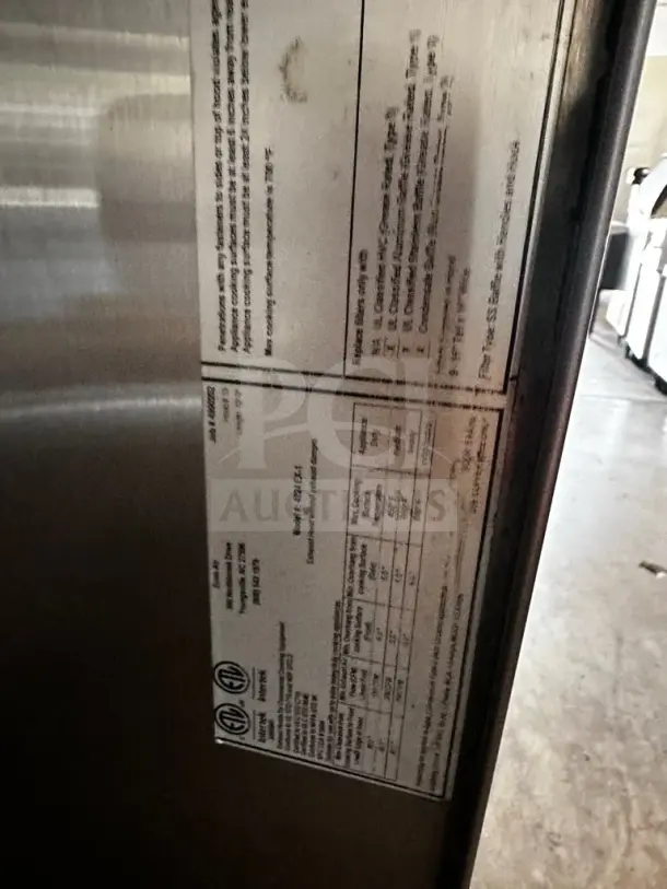 EconAir 12-ft stainless steel restaurant exhaust hood, model 4824 EX-1. Type I kitchen ventilation, labels indicate specs.