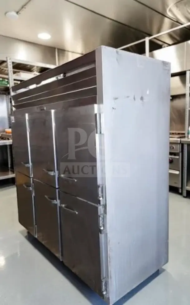 Traulsen G30001 refrigerator, 76" three-section, six half solid doors, stainless steel, 69.1 Cu. Ft., fully operational.