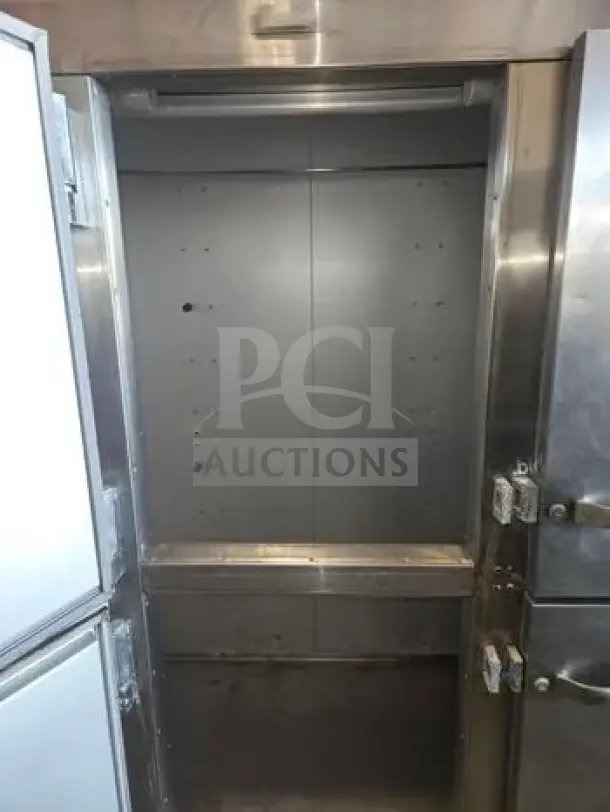 Traulsen G30001, 76" three-section reach-in refrigerator, stainless steel, six half solid doors, 69.1 Cu. Ft, prime condition.