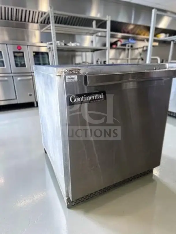 Continental D27N-U 27" stainless steel undercounter refrigerator, 7.4 cu. ft., superb condition, ENERGY STAR, NSF & ETL listed.