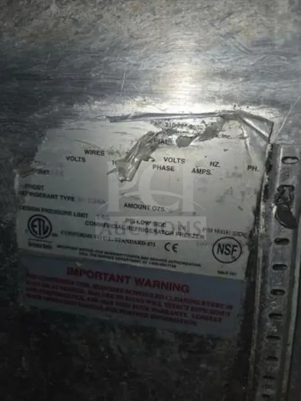 Continental D27N-U 27" stainless steel undercounter refrigerator. NSF & ETL listed labels visible.