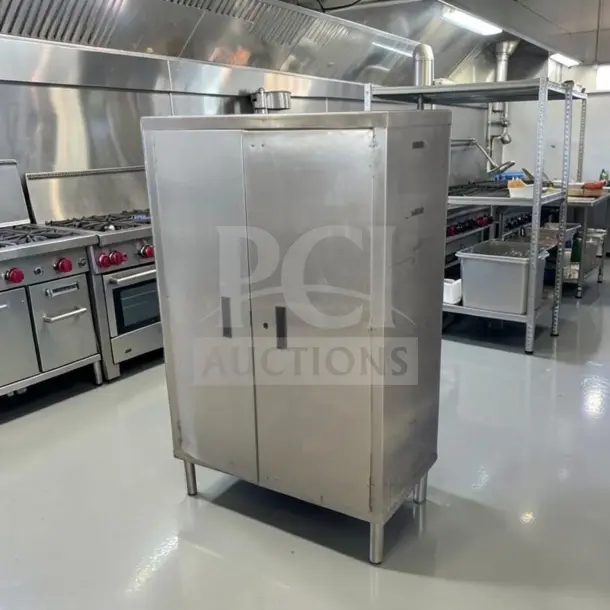 Stainless steel storage cabinet, 34" x 18" x 54", two-door, commercial-grade, pristine condition, ideal for restaurant use.