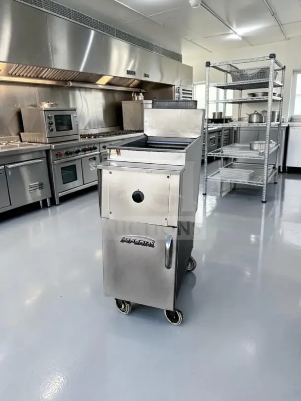 Stainless steel Imperial 40 lb gas floor fryer in excellent condition, model IMP-L-FRYR-1331, natural gas, fully tested.