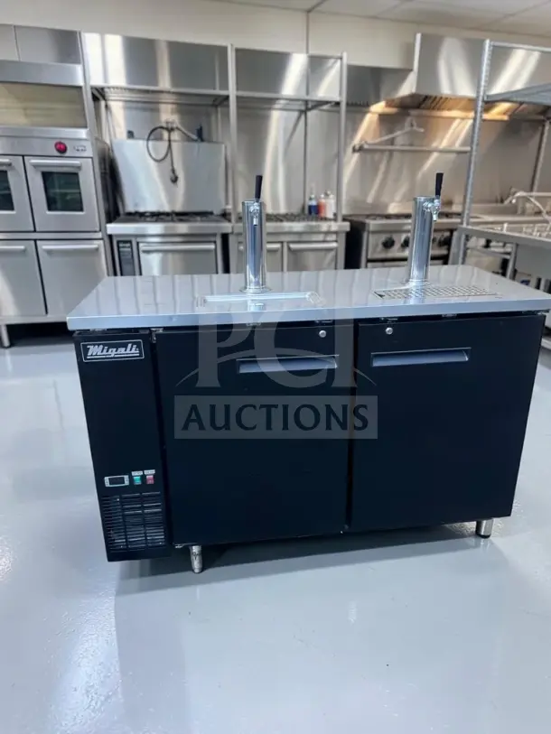 Migali C-DD60-2-HC kegerator, 60" with two taps, black, exceptional condition. Features logo, fully tested, 115V power.