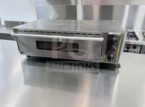 Equipex SODIR PZ4302D countertop electric pizza oven, single deck with fire brick stone, 120V, 5700W, excellent condition.