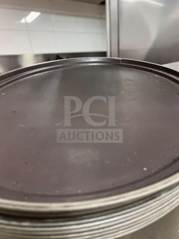Large oval non-skid serving tray, 27x22 inches, brown, commercial-grade, well-maintained, GEN-S-TRY-1334.