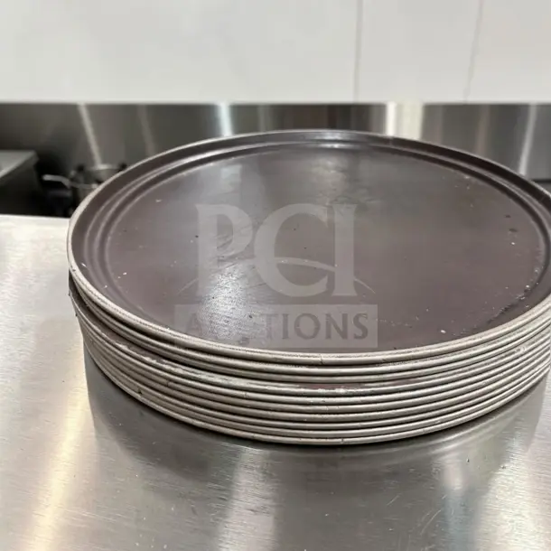Large oval non-skid serving trays, 27x22 in, brown, commercial grade, well-maintained, professionally inspected, model GEN-S-TRY-1334.