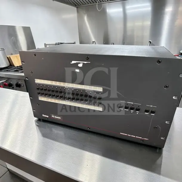 Extron CrossPoint Plus 1616 HVA matrix switcher, 16x16 RGBHV & stereo audio, 425 MHz, fully tested, operational, black exterior.