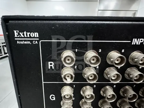 Extron CrossPoint Plus 1616 HVA matrix switcher inputs, showing labels and connectors, in good condition.