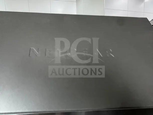 NETGEAR ProSAFE GS748Tv5 switch, 48 ports, high-grade condition. Embossed NETGEAR logo on top. Fully tested and operational.