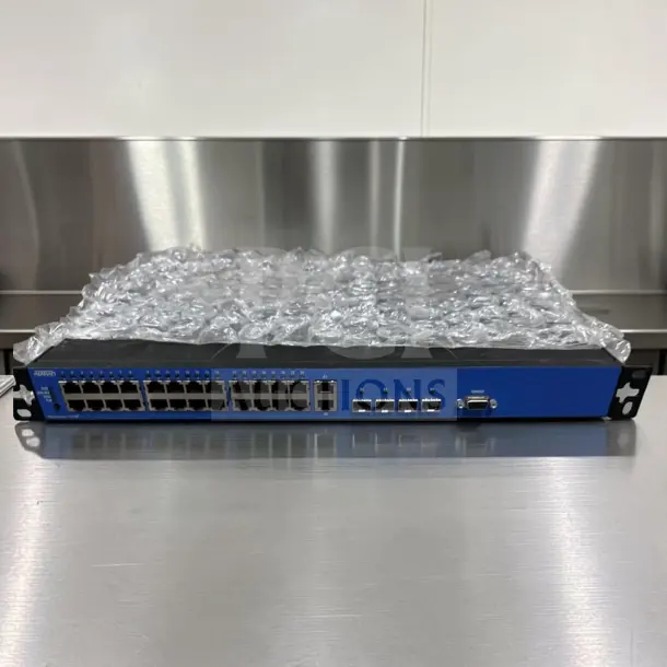 ADTRAN NetVanta 1234P 3rd Gen 24-Port Fast Ethernet PoE Managed Switch, quad gigabit uplinks, fully tested, model 1703595G1.