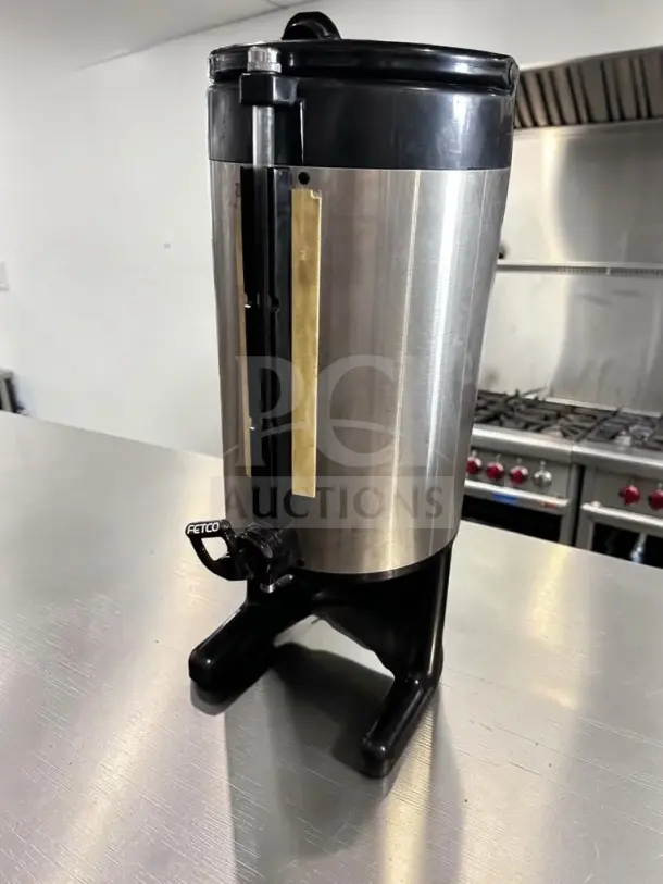 FETCO Luxus LD-15, 1.5-gallon thermal coffee dispenser in stainless steel. Non-electric, excellent condition, fully tested.