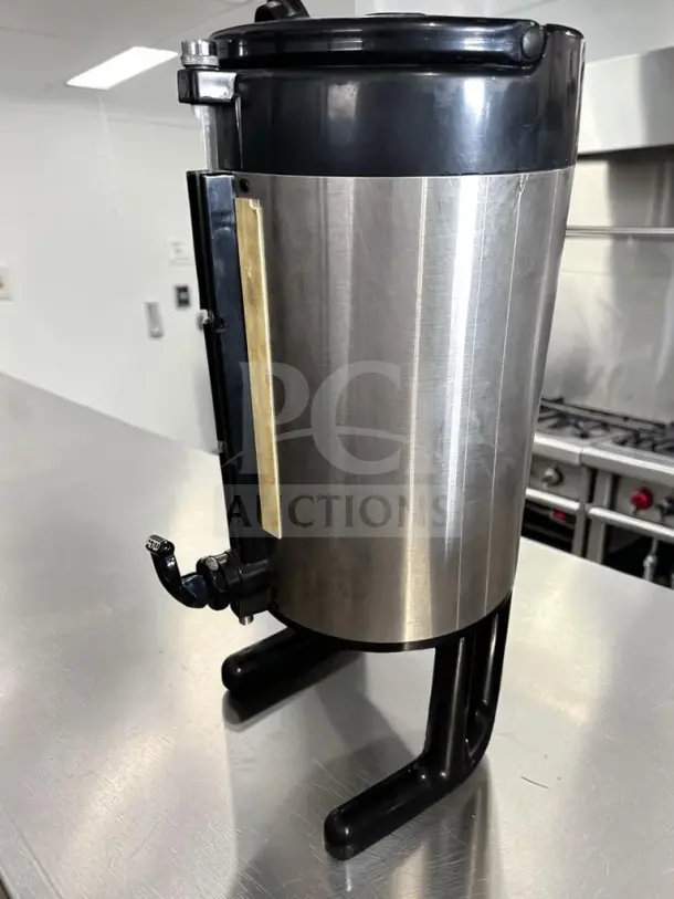 FETCO LUXUS LD-15 1.5-gallon non-electric stainless steel thermal coffee dispenser, optimal condition, fully tested.