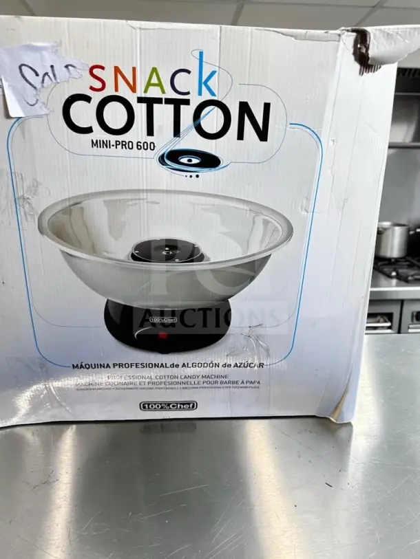 100% Chef Snack Cotton Mini-Pro 600, professional cotton candy machine, model 40/0004, in excellent condition with original packaging.