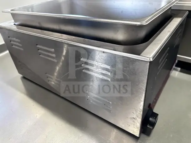 Kratos 28W-600 countertop food warmer, stainless steel, 12"x20", in superior condition. Model KRA-S-WAR-1341, 1200W, 120V. Fully tested.