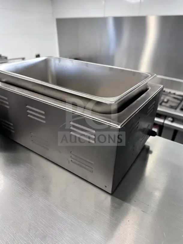 Kratos 28W-600 countertop food warmer, full-size 12" x 20", stainless steel, superior condition, 120V 1200W, angled display.