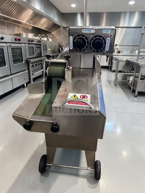 Ming Chun MG-666 conveyor vegetable cutter, commercial-grade, adjustable blade, 110V, excellent condition, fully operational.