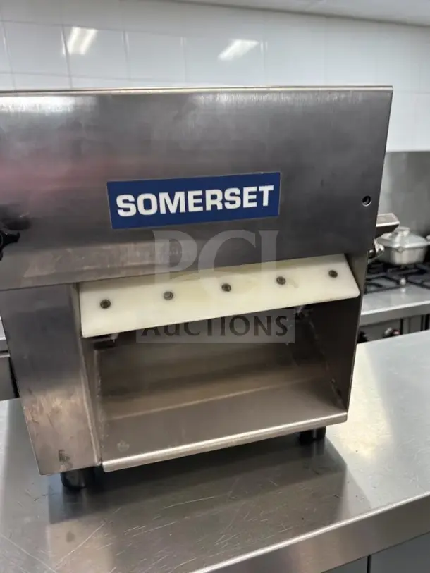 Somerset CDR-100P dough sheeter in outstanding condition, 10" countertop model, 115V, fully operational, stainless steel.