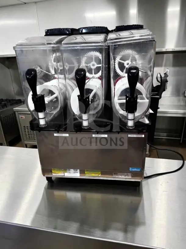 Crathco Frosty Dream 3 triple 3.2-gallon granita machine, model 1206-011, in excellent condition, fully operational.
