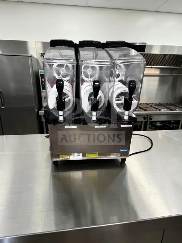 Crathco Frosty Dream 3 triple 3.2-gallon granita machine, pristine condition, fully tested, 115V, stainless steel.