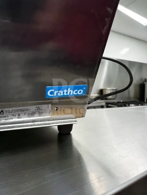Crathco Frosty Dream 3 granita machine corner with visible label, in excellent condition on a metal counter.