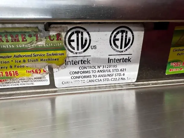 Crathco Frosty Dream 3 beverage machine label showing ETL and Intertek certifications, highlighting sanitation standards.