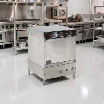 CMA L-1X undercounter dishwasher, well-maintained, 30 racks/hour, 24" wide, 115V, fully tested, operational, stainless steel.