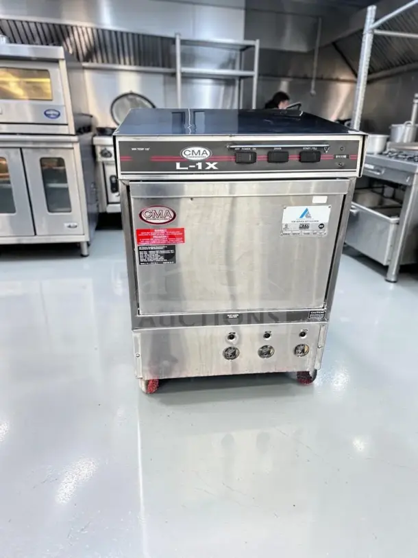 CMA Dishmachines L-1X undercounter dishwasher, 24" low-temp, 30 racks/hour, 115V, well-maintained, fully tested, operational.