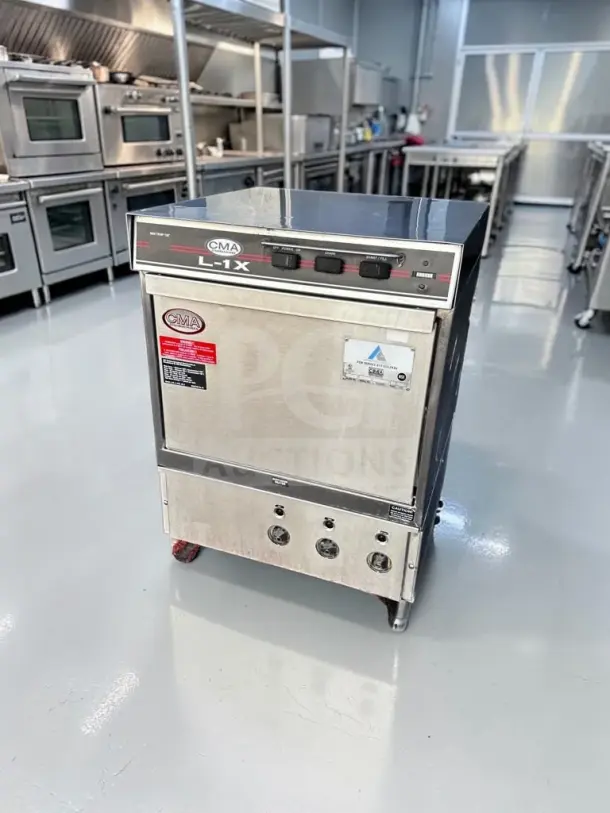CMA Dishmachines L-1X Undercounter Dishwasher, 24" wide, model CMA-L-DWS-1350, 30 racks/hour, 115V, well-maintained condition.