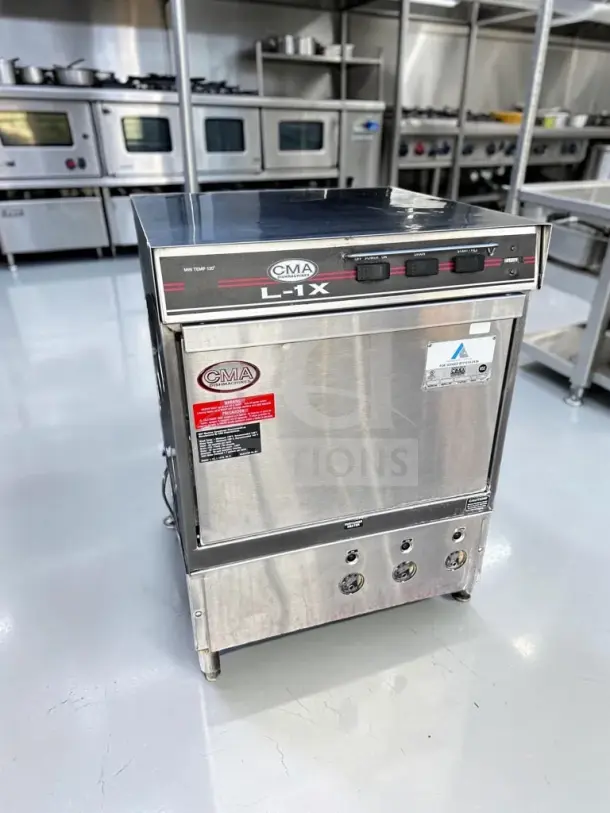 CMA Dishmachines L-1X undercounter dishwasher, 24" low-temp, 30 racks/hour, 115V, well-maintained, fully tested, operational.