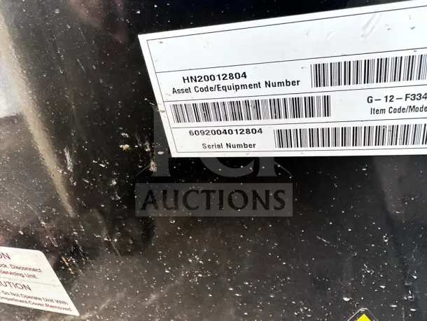 IDW G-12-F334B-HC cooler label, showing asset code HN20012804 and serial number 6092004012804, model visible.