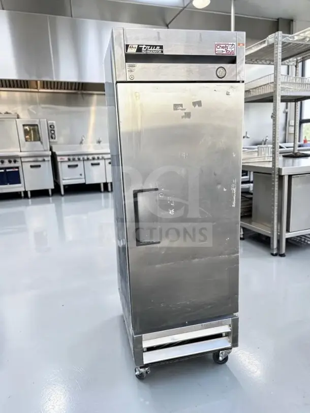 True T-19 Reach-In Refrigerator, 27" solid door, 19 cu. ft., tested operational, stainless steel, visible markings.