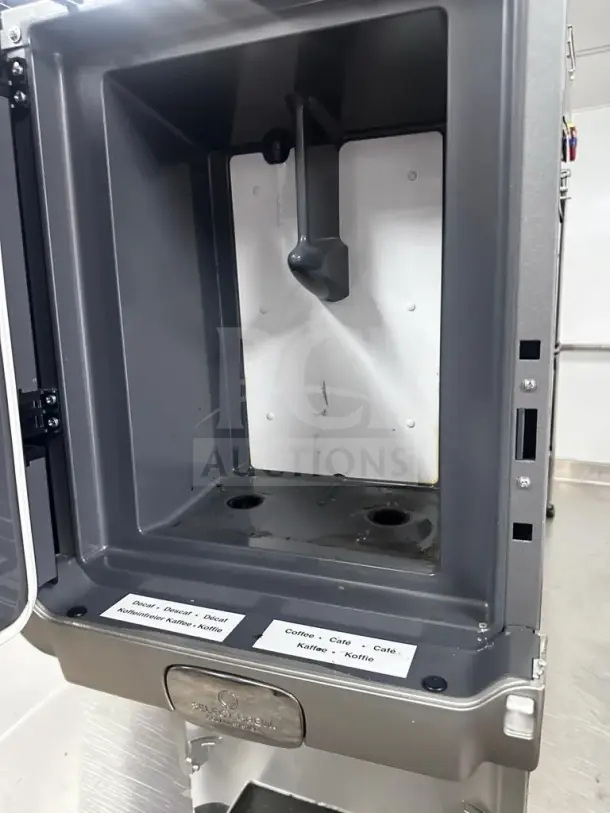 Remarkable condition Folgers Select Brew NG-300 dual blend coffee dispenser. Clean interior, clearly labeled sections, fully operational.