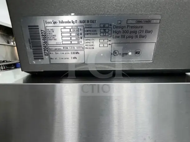 Folgers Select Brew NG-300 commercial coffee dispenser, dual blend system, tag shows voltage and pressure specs, made in Italy.