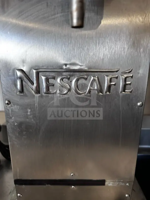 Grindmaster-Cecilware JAVA 2QB dual-hopper coffee dispenser with Nescafé logo, stainless steel, tested, ideal for regular and decaf.