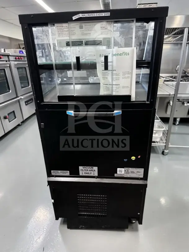 Structural Concepts COU2757R merchandiser in superior condition, dual-temperature, 27.5" width, fully tested, 120V, visible labels.