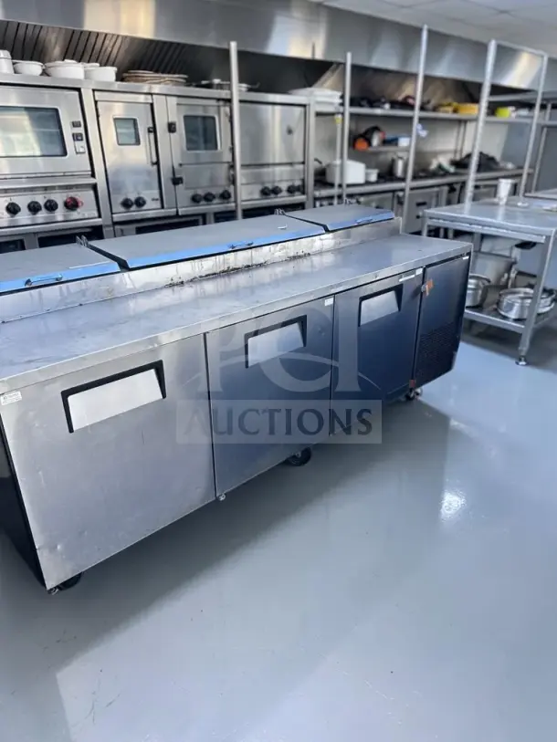 True TPP-93 three-door refrigerated pizza prep table, 93", holds 12 1/3-size pans, excellent condition, model TRU-L-PPT-1361.